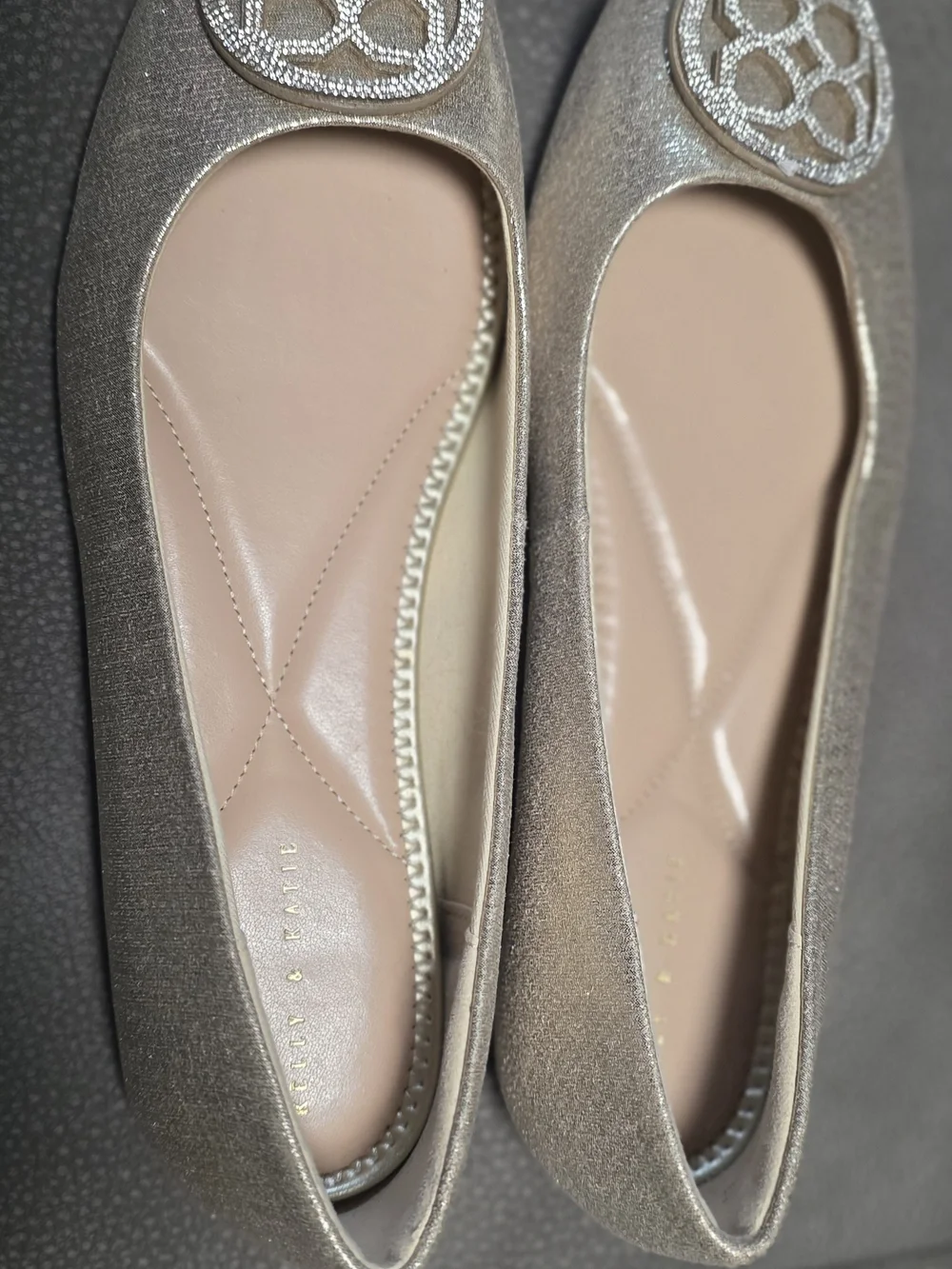 Kelly & Katie Metallic Champagne Ballet Flats with Rhinestone Medallion